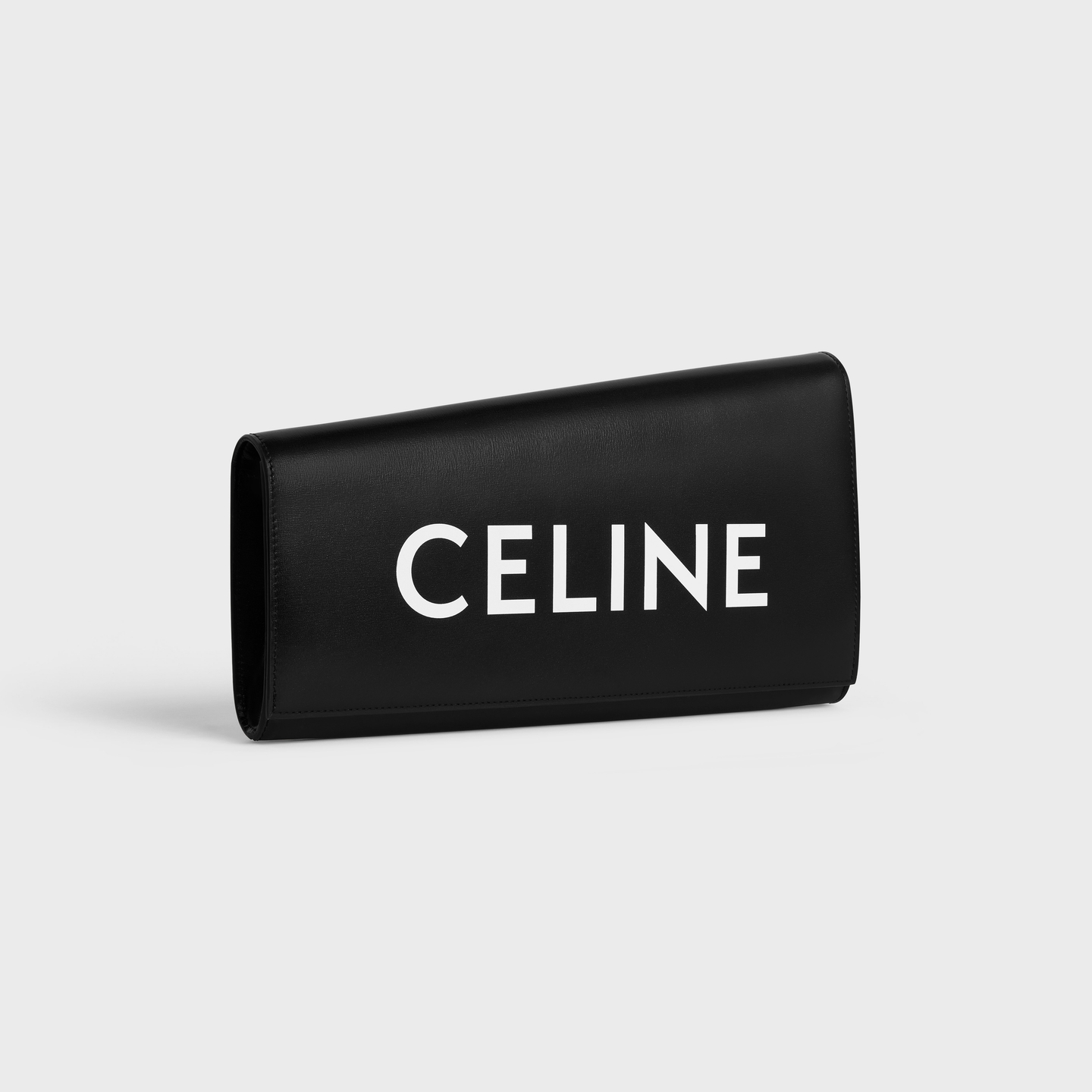 CELINE ASYMETRIC CLUTCH in SHINY CALFSKIN WITH CELINE PRINT 110763EPT.38NO