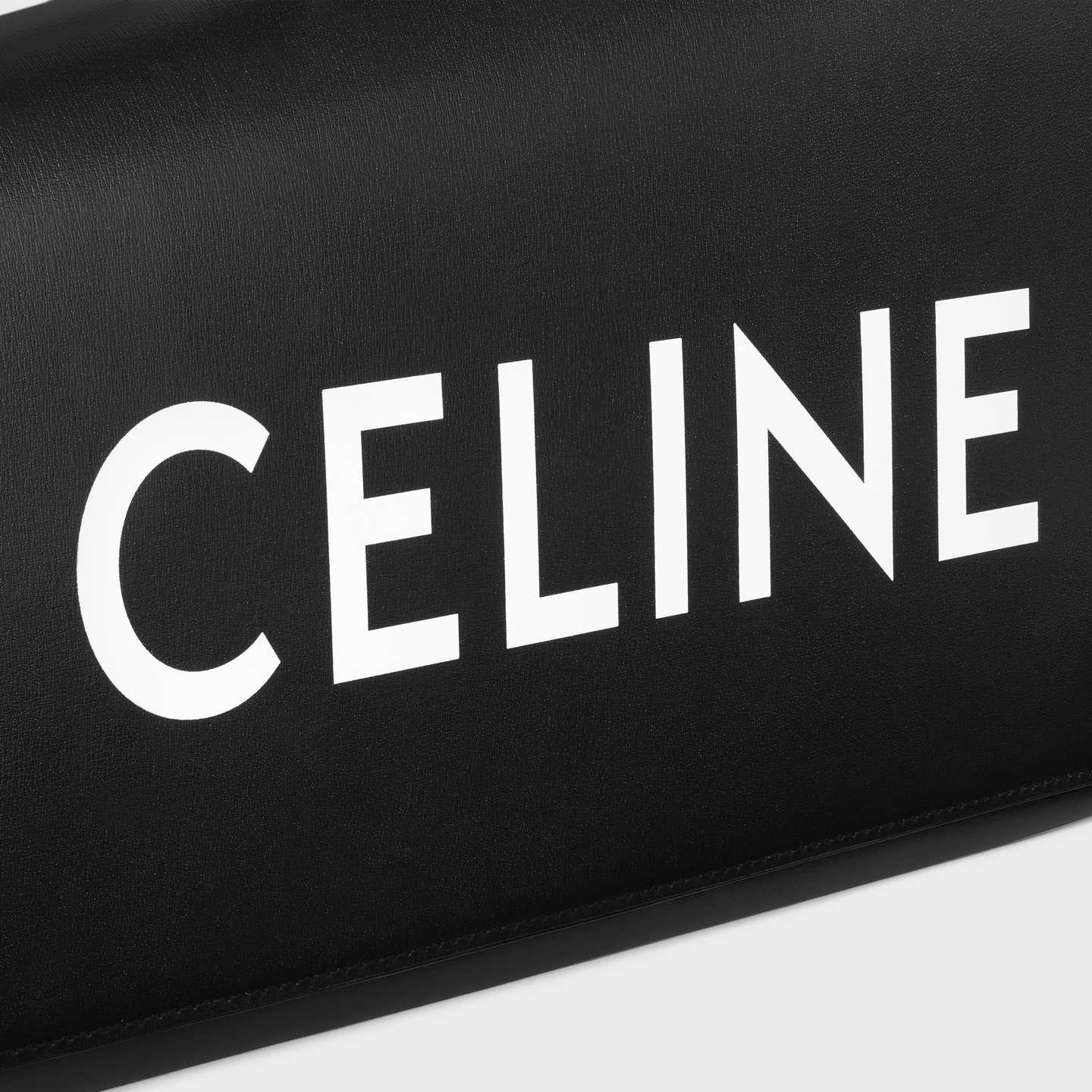 CELINE ASYMETRIC CLUTCH in SHINY CALFSKIN WITH CELINE PRINT 110763EPT.38NO