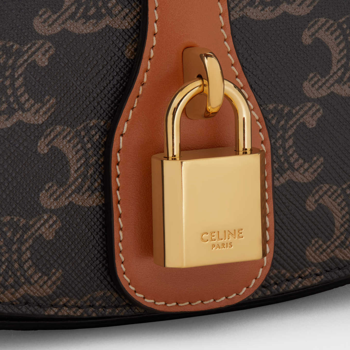 CELINE CLUTCH ON STRAP TABOU in Triomphe canvas and calfskin 10I592DQ2.04LU