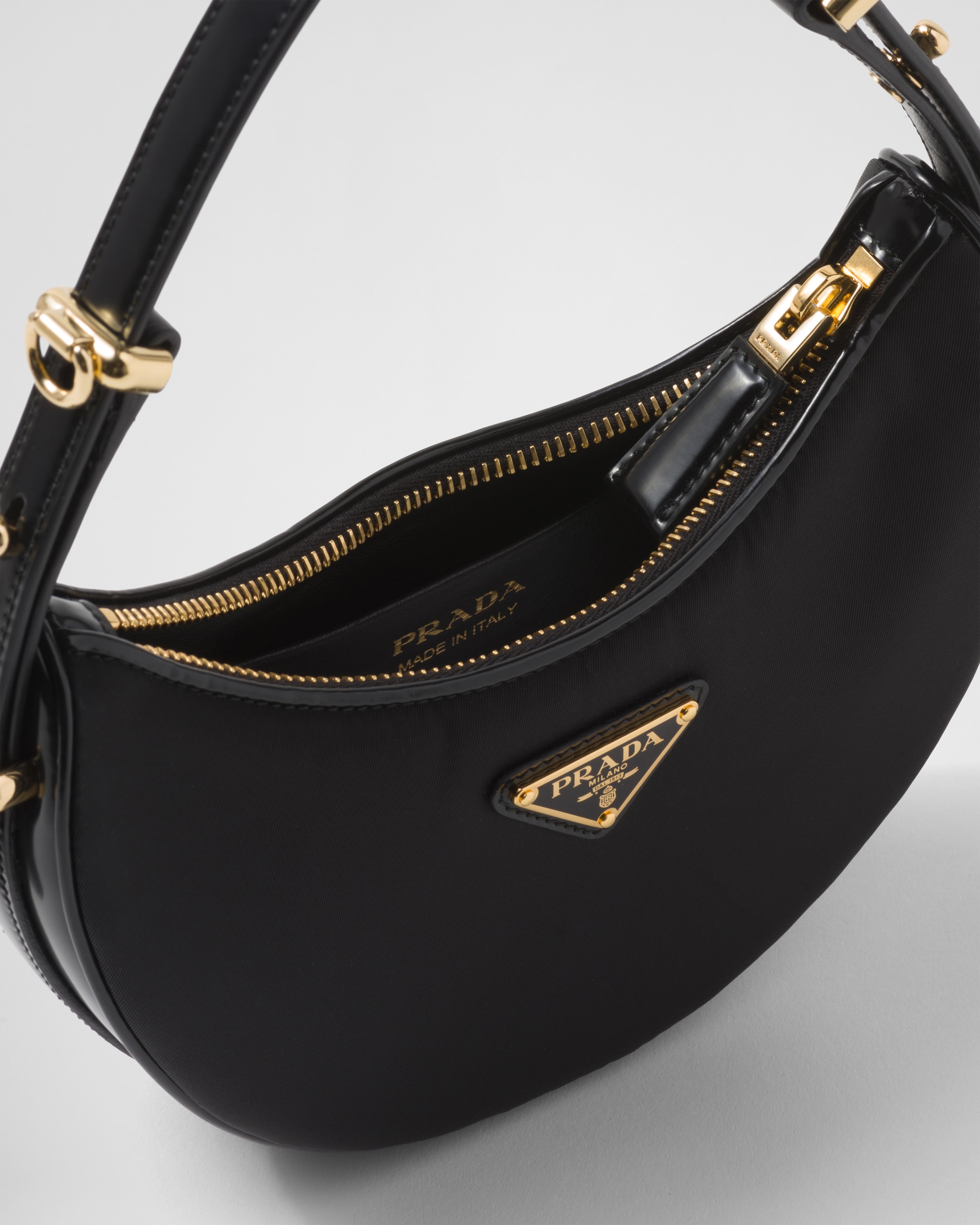 PRADA Arqué Re-Nylon and brushed leather mini shoulder bag 1BC199_R789_F0002_V_OOO