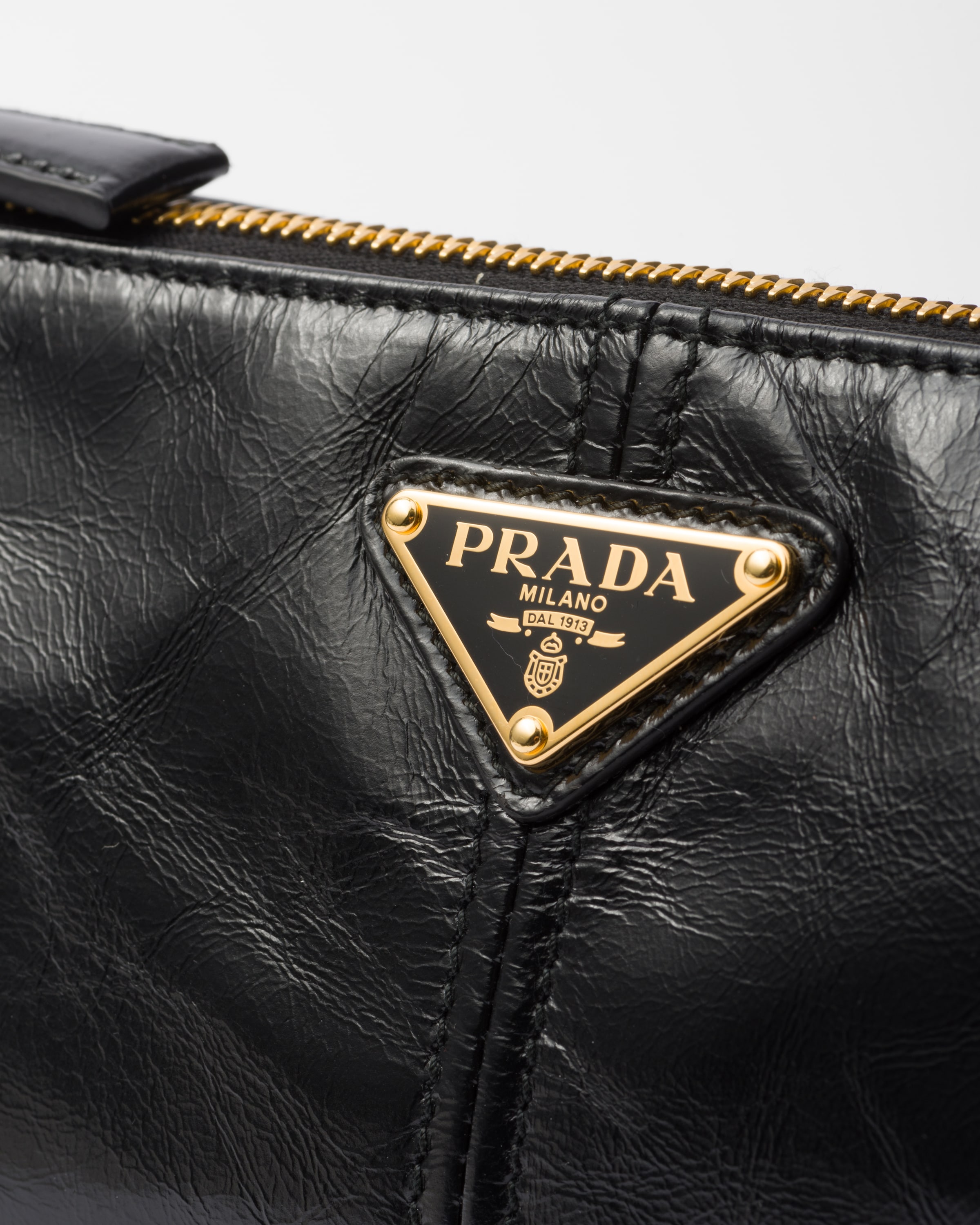 PRADA Re-Edition 2002 medium leather shoulder bag 1BC221_2CYR_F0002_V_OOO