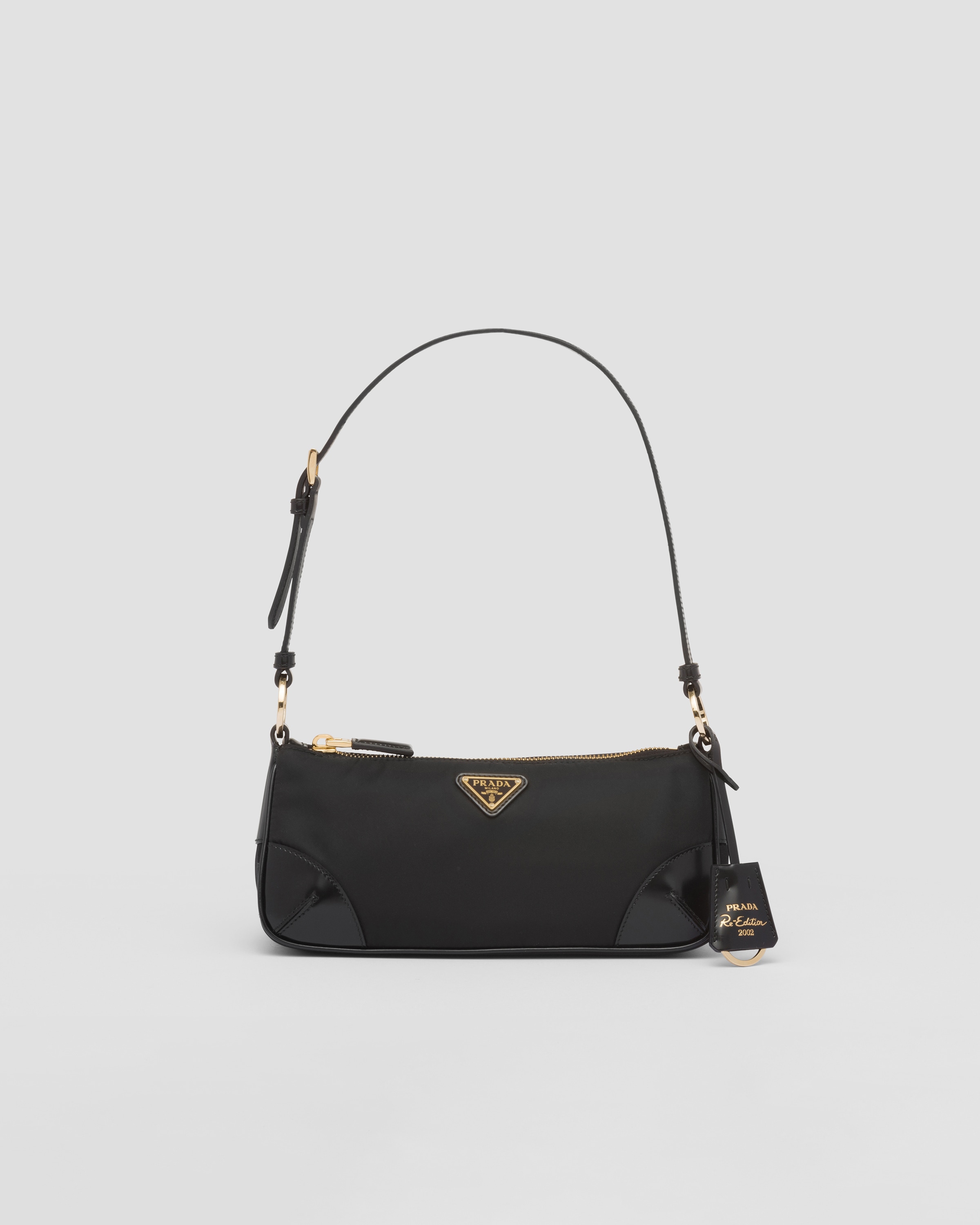 PRADA Re-Edition 2002 Re-Nylon and brushed leather shoulder bag 1BC201_R789_F0002_V_OOO