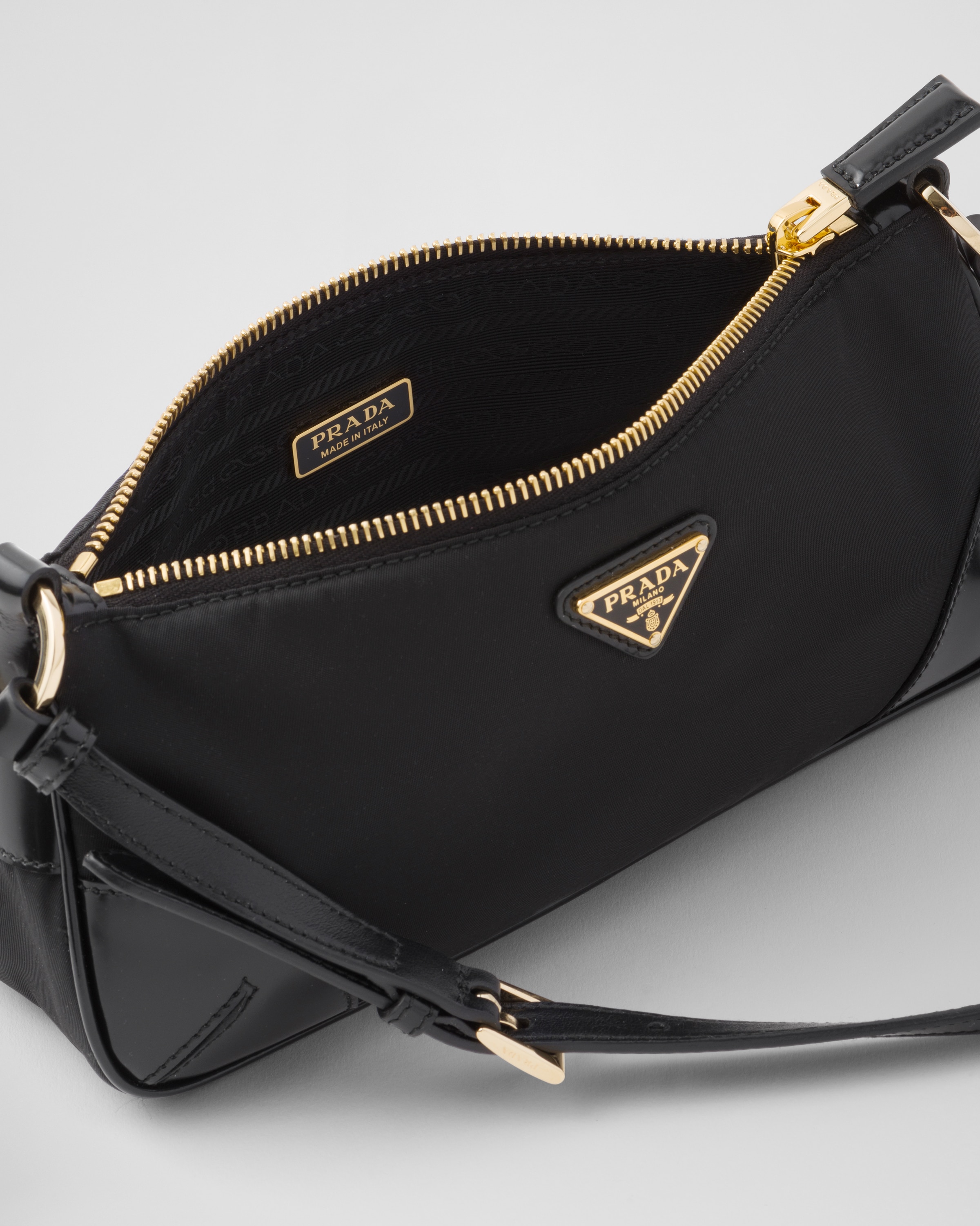 PRADA Re-Edition 2002 Re-Nylon and brushed leather shoulder bag 1BC201_R789_F0002_V_OOO