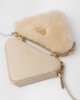 PRADA Triangular shearling and Saffiano leather mini-pouch 1NR015_2ECY_F0379