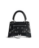 balenciaga Hourglass X Le Cagole Medium Handbag in Black 7815852AAY11000